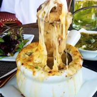 French Onion Soup · Emmental Swiss cheese and homemade croutons.