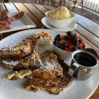 Croissant French Toast · Made fresh daily croissant cooked in eggs, butter and drizzled with our homemade caramel sau...