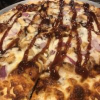 BBQ Chicken Pizza · BBQ sauce, chicken, chopped garlic, red onions, and cilantro.