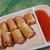 Spring Rolls · Veggies rolls deep-fried and served with sweet and sour dipping sauce. 