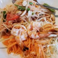 Papaya Salad Deluxe · Julienne green papaya, string beans, tomatoes and roasted peanuts mixed with spicy lime dres...