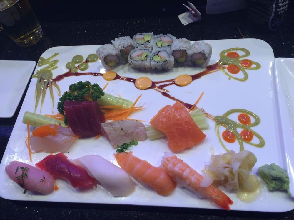 Sushi and Sashimi Platter for 2 · 10 pieces of sushi, 20 pieces of sashimi, and a rainbow roll.