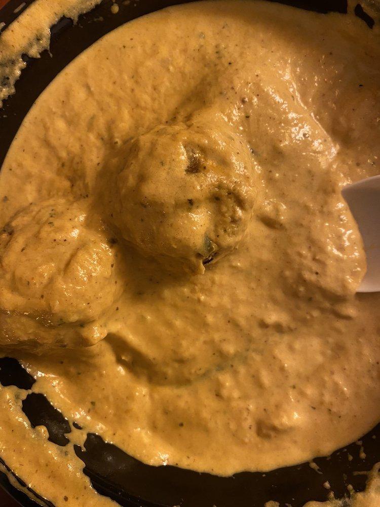 Malai Kofta · Vegetable croquettes, creamy nut sauce.