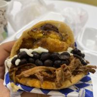 Pabellon Arepa · Shredded beef, black beans, white cheese and sweet plantains.