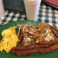 Country French Toast · French toast served with 2 eggs any style, bacon or sausage.