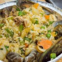 Arroz Marinero - Seafood Mix Plate · Clams, shrimp, scallops, calamari, mussel, veggies, all mixed with Spanish yellow rice.