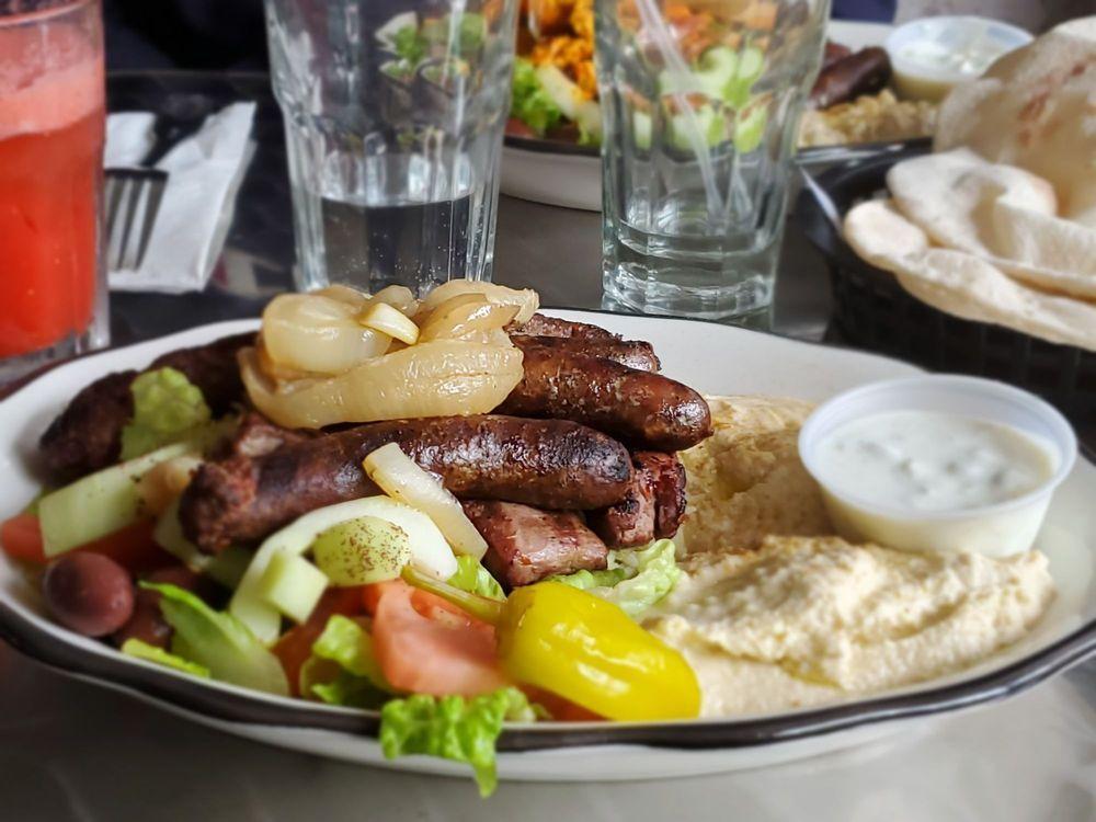 Mixed Grill Platter · A combination plate with a choice of three items. Served with pita, salad, rice, hummus and babaganouj.