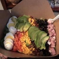 Cobb Salad · Romaine, chicken, bacon, egg, cheddar, tomato and avocado.