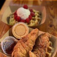Chicken and Waffles · Buttermilk fried chicken tenders (on a liege waffle) with a side of syrup and special sauce.