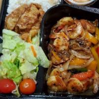 Shrimp Teriyaki Box · Stir fan fried shrimps with teriyaki sauce. Served with rice, salad, kimchi, dumplings and s...