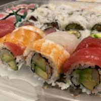 Rainbow Roll · Tuna, albacore, salmon and shrimp wrapped around California roll