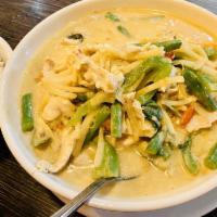 Green Curry · Green curry in coconut milk with eggplant, bamboo shoots, bell peppers, onion, green beans a...