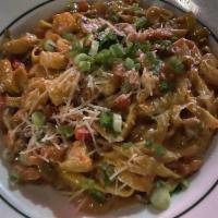 Cajun Chicken And Shrimp Fettuccini · Mushrooms, Tomatoes, Green Onions and Cajun Cream