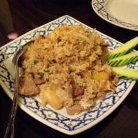 Pineapple Fried Rice · Choice of meat with egg, pineapple, onion, carrot and cashew nut.