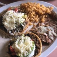 Gordita or Sope Dinner · sope served with beans, lettuce, tomato, cheese, avocado, sour cream.
gorditas served with b...
