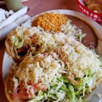 Barbacoa · sope served with beans, lettuce, tomato, cheese, avocado, sour cream.
gorditas served with b...