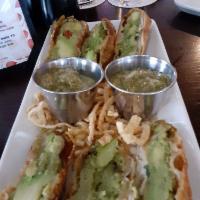 Avocado Eggrolls · Blu Alehouse favorite: fresh avocados, sun dried tomatoes, cilantro; wrapped in a crispy egg...