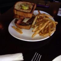 Texas Burger · Blu Alehouse favorite: with jalapeno steak sauce, pepper jack cheese, bacon and onion ring o...