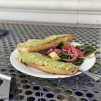Avocado Toast · Lemony, crushed avocado on toasted Companion Bakeshop bread with dressed baby spinach, pickl...