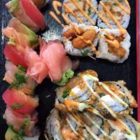 Incredible Salmon Roll · Big and fried roll. Spicy mayo, green onion, cream cheese, sliced lemon, jalapeno, salmon on...