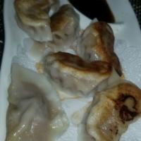 Pork Dumplings · Served with six pieces.