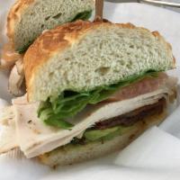 Pesto Chicken Sandwich · Roast chicken, provolone cheese, roasted red pepper, tomatoes and homemade basil pesto on du...