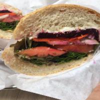 Harvest Vegetarian Sandwich · Hummus, honey goat cheese, mixed greens, sweet roasted beets, tomatoes, carrots and red onio...
