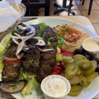 Beirut Mix Combo Plate · 3 kebab skewers, choice of chicken, kafta, lamb, beef steak, gyro, or shrimp. Served with ri...