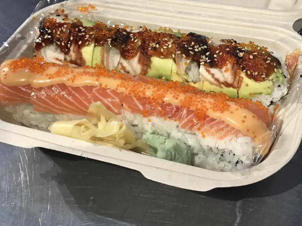 Orange Blossom · Salmon and avocado inside, topped with salmon and tobiko. 