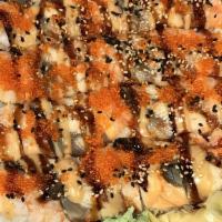 Super California · Crabmeat and avocado inside, topped with shrimp, unagi, tobiko and sesame seed. 