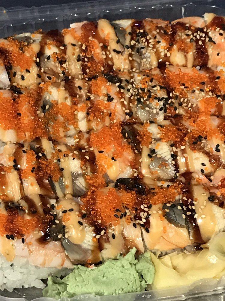 Super California · Crabmeat and avocado inside, topped with shrimp, unagi, tobiko and sesame seed. 