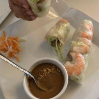Traditional Shrimp and Pork Imperial Rolls · Served with Vietnamese dipping sauce, lettuce wrappers, pickled veggies and herbs.