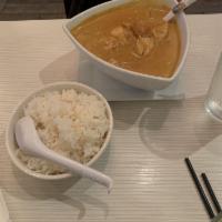 Chicken Curry · Boneless chicken, potato, sweet potato and onion cooked in curry and coconut sauce. Served w...