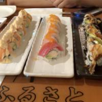 Dragon Roll · In: shrimp tempura and real crab. Out: unagi, avocado and tobiko.