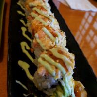 Spider Roll · In: soft shell, real crab, avocado and cucumber. Out: tobiko.
