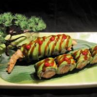 Bruce Roll · Tempura shrimp and lumb crab meat topped with avocado and eel sauce.