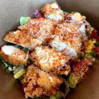 Fried Chicken Salad · bed of chopped romaine lettuce goes with elote, boiled egg, cherry tomatoes, bacon bits, pic...