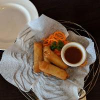 Spring Roll · Crispy rice flour rolls with minced chicken mushrooms, bean thread and vegetables. Served wi...