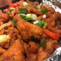 Firecracker Chicken · Our chef's specialty. Crispy chicken with chili paste, onion, scallion and splash of white w...