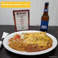 Enchiladas · Two enchiladas filled with cheese, choice of meat, topped with red or green sauce, served wi...