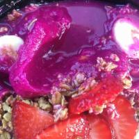 Pitaya Bowl · Blended Pitaya with Mango, Lime Juice and Banana. Topped with Strawberries, Banana, Granola ...