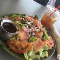 Smoked Salmon Salad · Romaine Lettuce, Spinach, Smoked Salmon, Red Onions, Capers, Tomatoes, Croutons and Balsamic...
