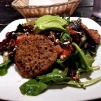 Rumi Salad · Mixed greens, dried cranberries, crushed walnuts, feta cheese, tomato and Rumi raspberry vin...