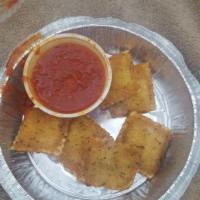 Fried Ravioli · 7 ravioli stuffed with ricotta, fried, and served with a side of our homemade marinara