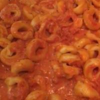 Tortellini · Made with red sauce or Alfredo.