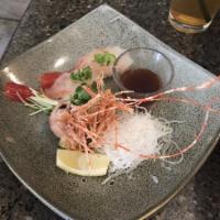 Chronic Roll · Shrimp tempura, avocado, krab, cucumber topped with spicy tuna, tempura flakes and sweet soy...