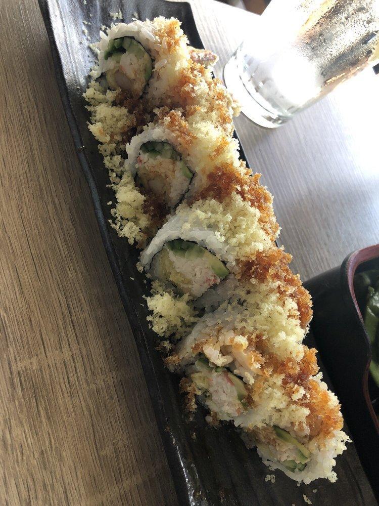 Crunchy Roll · Shrimp tempura, krab, avocado, cucumber with crunchy tempura flakes on top, sweet soy glaze.