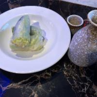 Summer Roll · Fresh lettuce, cilantro, and carrot wrapped in rice paper. Add protein for an additional cha...