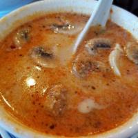 Tom Yum Gai Soup · Served with chicken, mushrooms, tomatoes, lemongrass, kaffir lime leaves and hot chili paste.