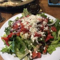 Mediterranean Salad · Mixed lettuces with garbanzo beans, roasted red peppers, red onions, diced tomatoes, roasted...